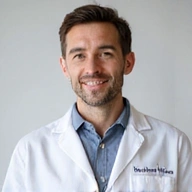 Portrait of Dr. Jan Kowalski, a male doctor with a warm and knowledgeable expression